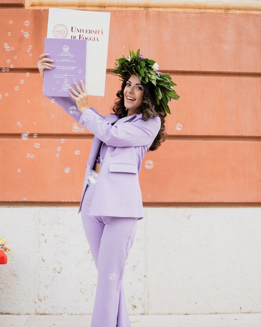 studente felice stampa tesi di laurea con tesi24